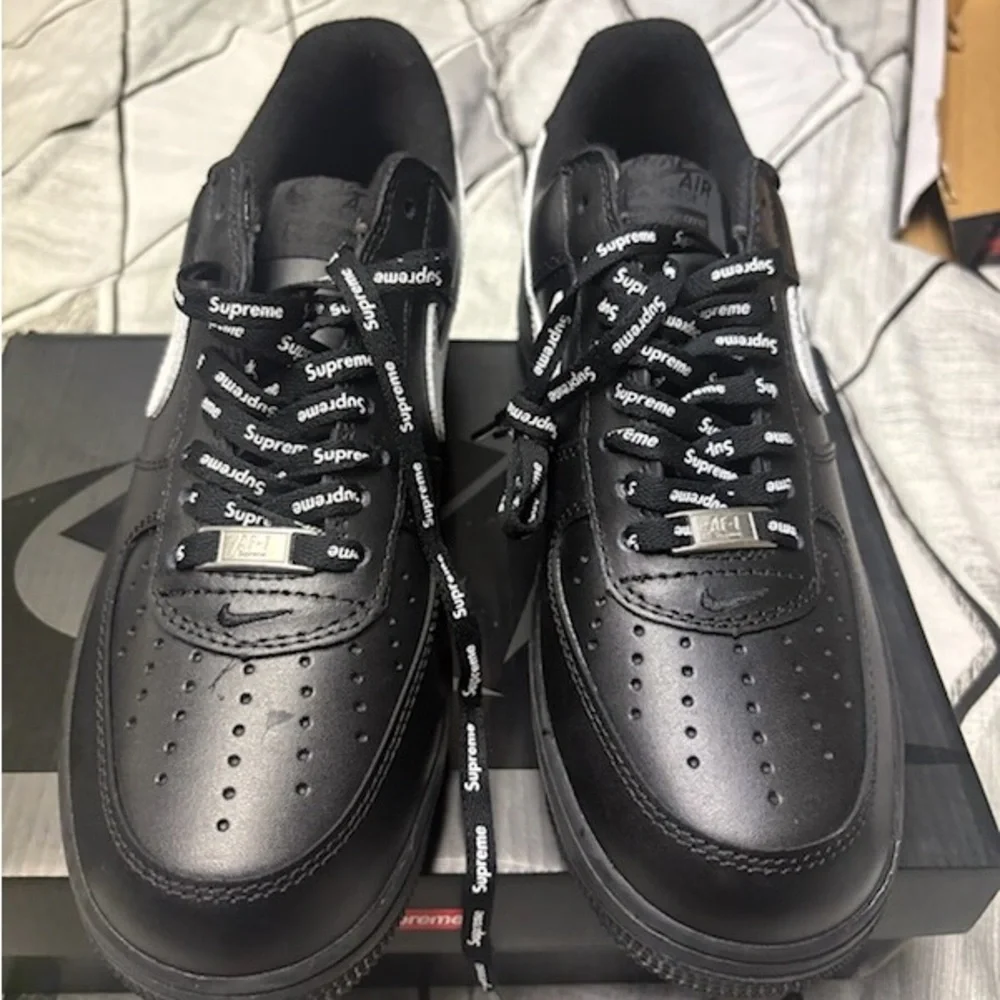 Supreme Black Sneakers with White Swoosh